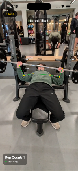 Bench press camera coach screen with real-time pose tracking and form feedback overlays